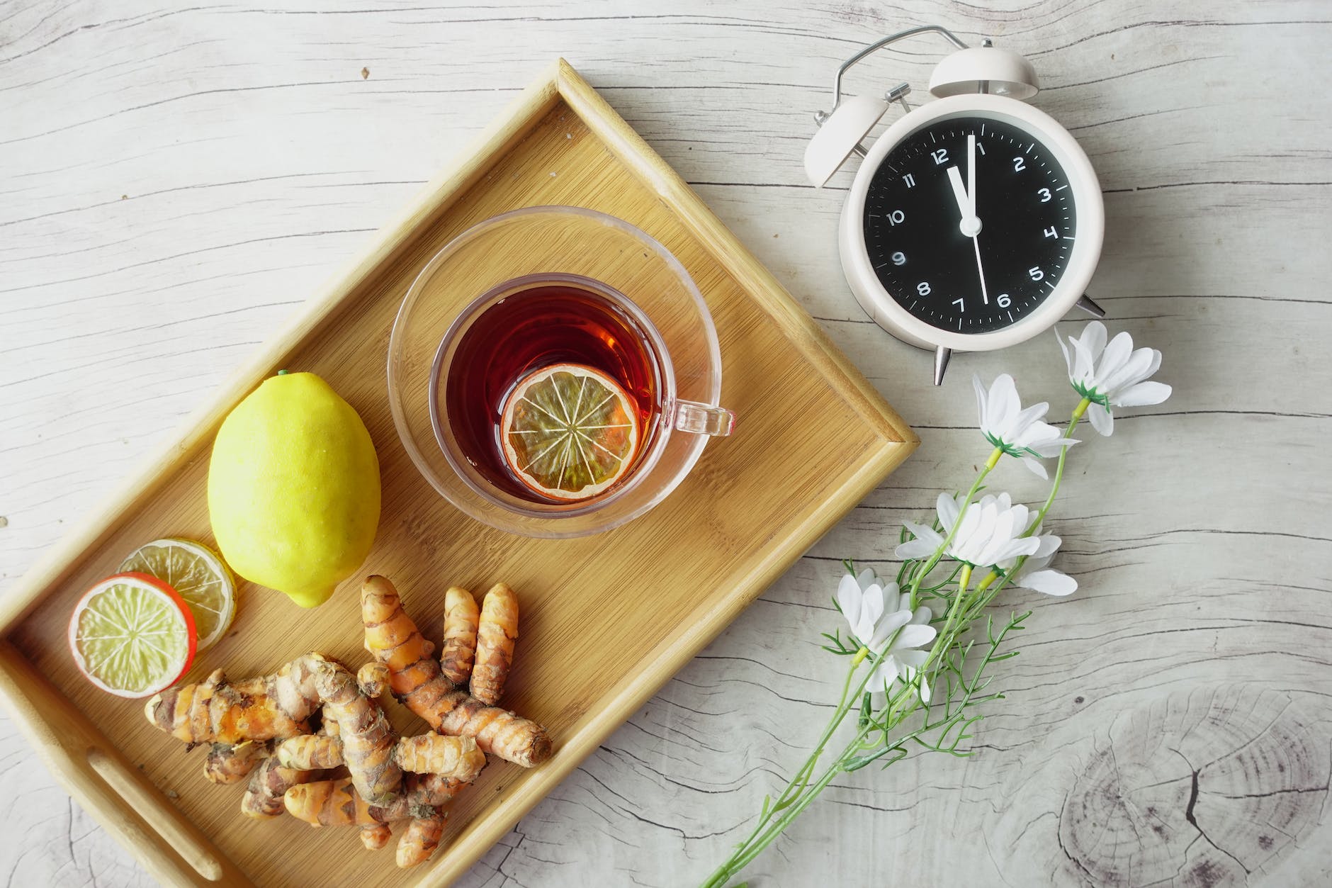 healthy herbs and drink on a wooden tray